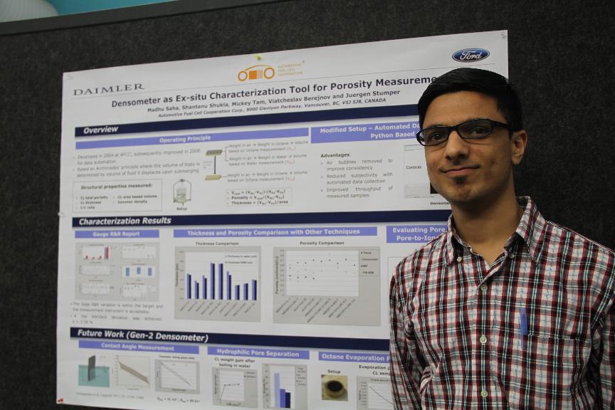 Shantanu Shukla with a different poster co-authored by Madhu Saha, Mickey Tam, Viatcheslav Berejnov, and Juergen Stumper.